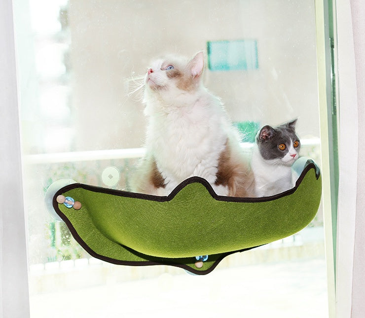 Hamac pour chat sur le rebord de la fenêtre