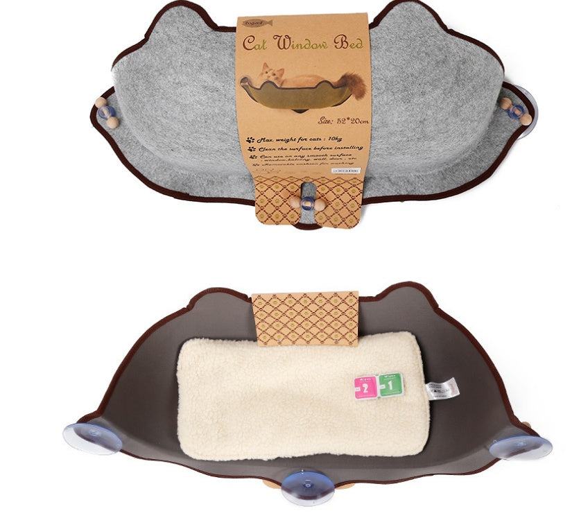 Hamac pour chat sur le rebord de la fenêtre